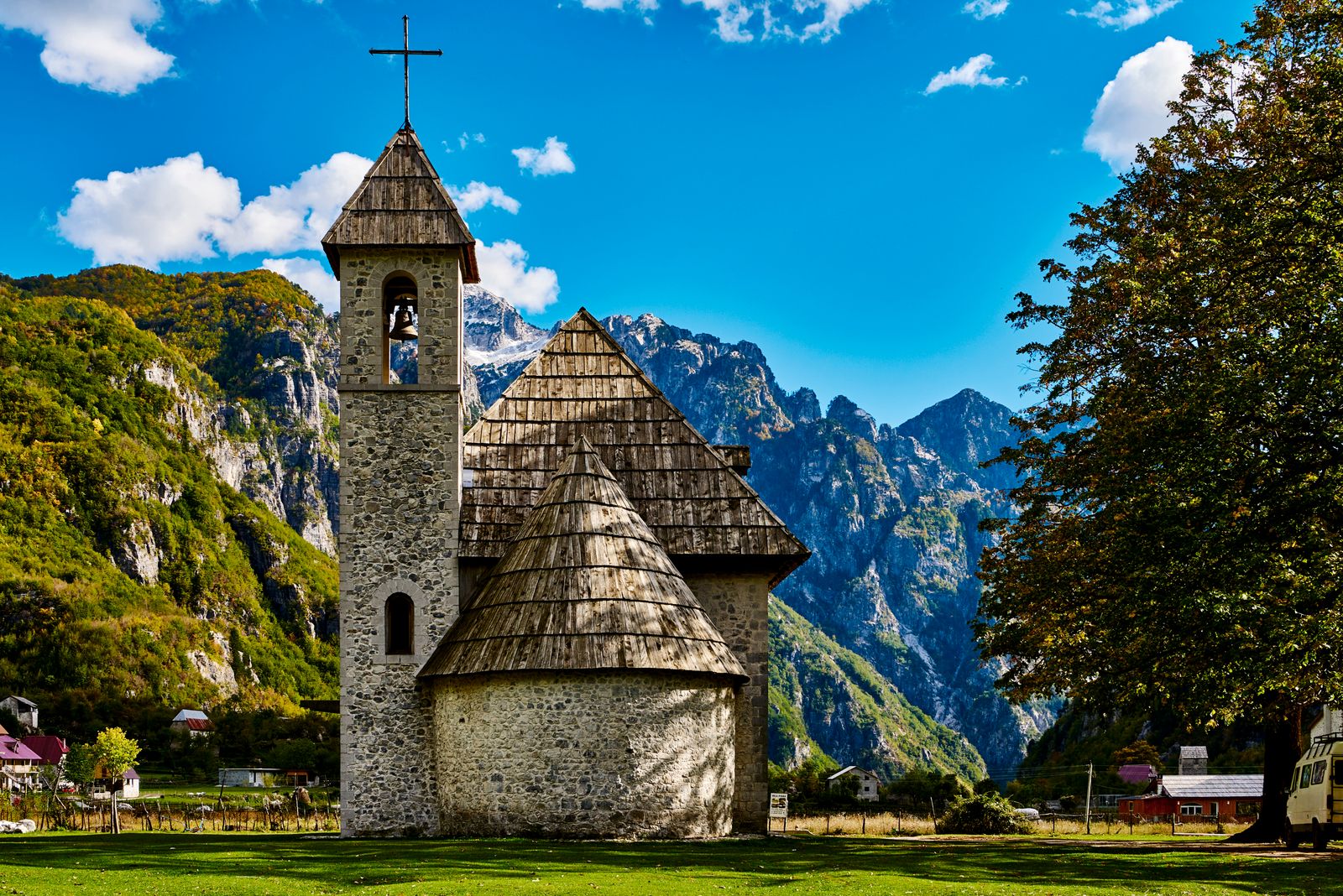 A small church in the Teth National Park with the Albanian Alps in the background