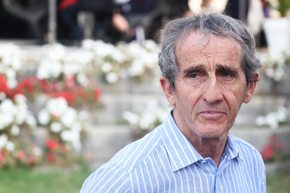 Alain Prost looks on with a steely gaze