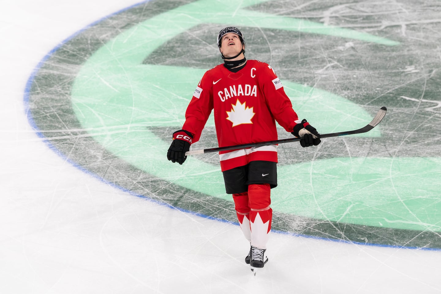 Canada captain Macklin Celebrini looks skyward during his squad's shocking upset loss to Finland in the hockey world championship semifinals Saturday in Zurich, Switzerland.