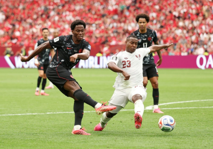 Bangkok Post - Canada romp to first World Cup win, Switzerland thump Bosnia