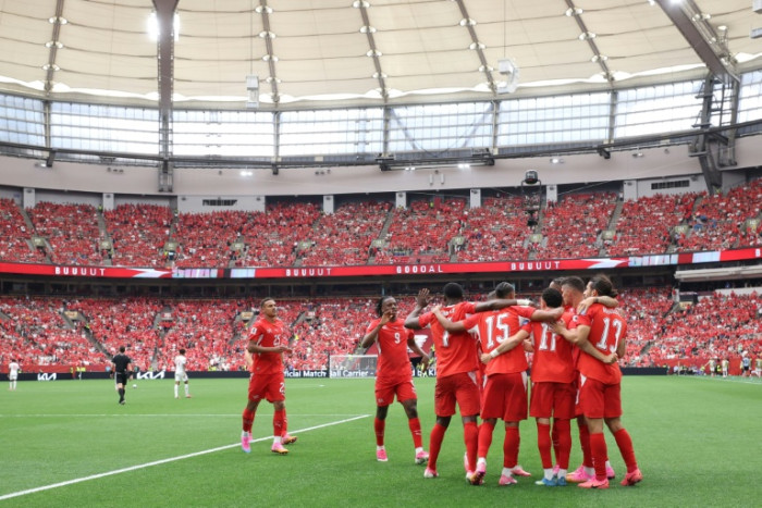 Bangkok Post - Switzerland, Canada advance as Brazil eye last 32