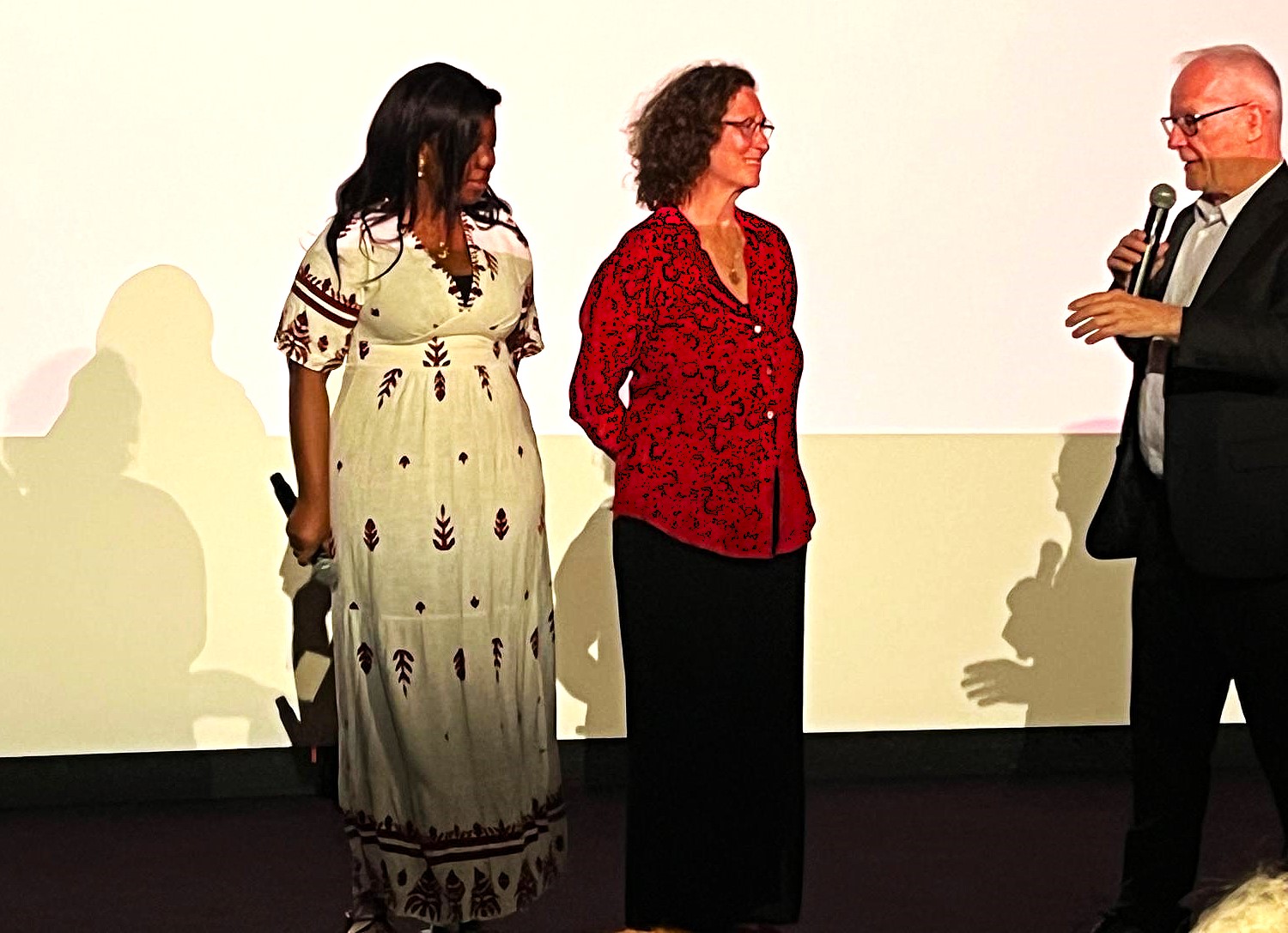 Silvia Voser (center) and Nora Ouedraogo, Idrissa's daughter, present the restored copy of 'Tilaï' at a special screening in Cannes, on May 13, 2026.