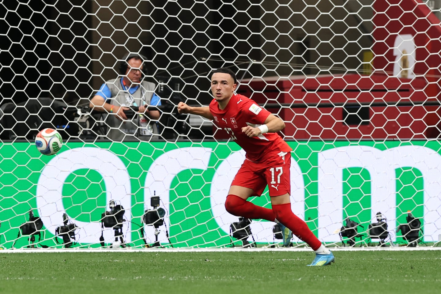 Ruben Vargas kicks off a Swiss celebration after scoring the decisive penalty of the shootout to oust Colombia in a Round of 16 match Tuesday in Vancouver, British Columbia.