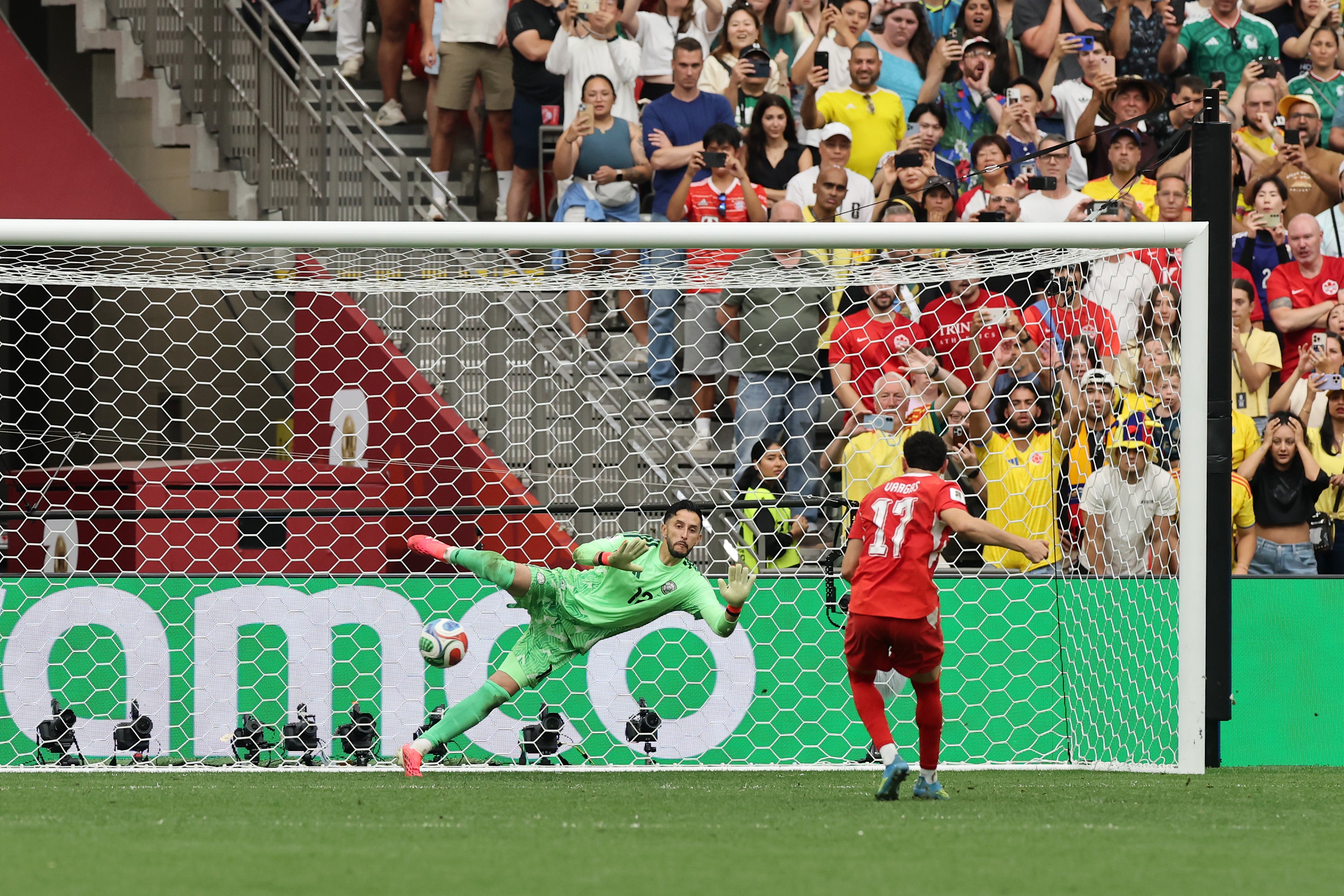Ruben Vargas of Switzerland scores the fifth and winning penalty