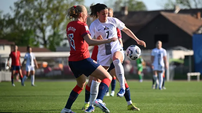 Slovenia v Norway Nina Kajzba of Slovenia is challenged by Frida Maanum of Norway.
