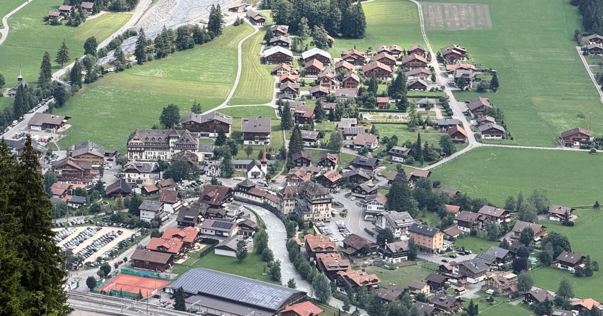 A looming rock collapse threatens a Swiss village as thawing permafrost destabilizes the Alps