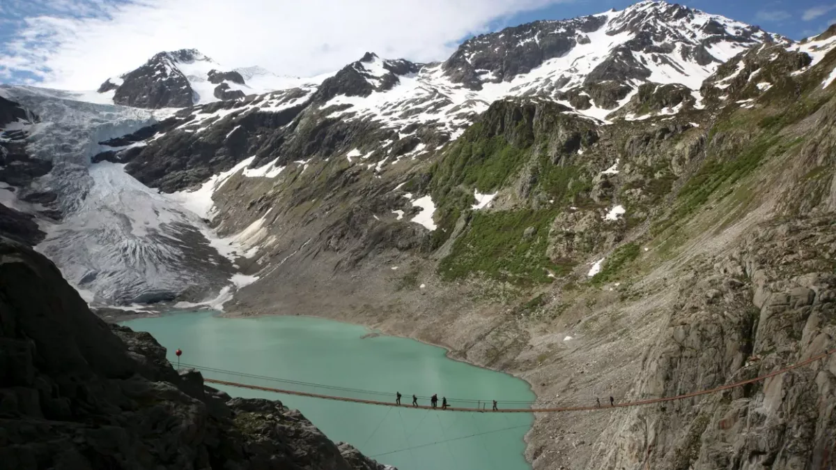 Melting Swiss glacier reveals bodies of mountaineers missing since 1992