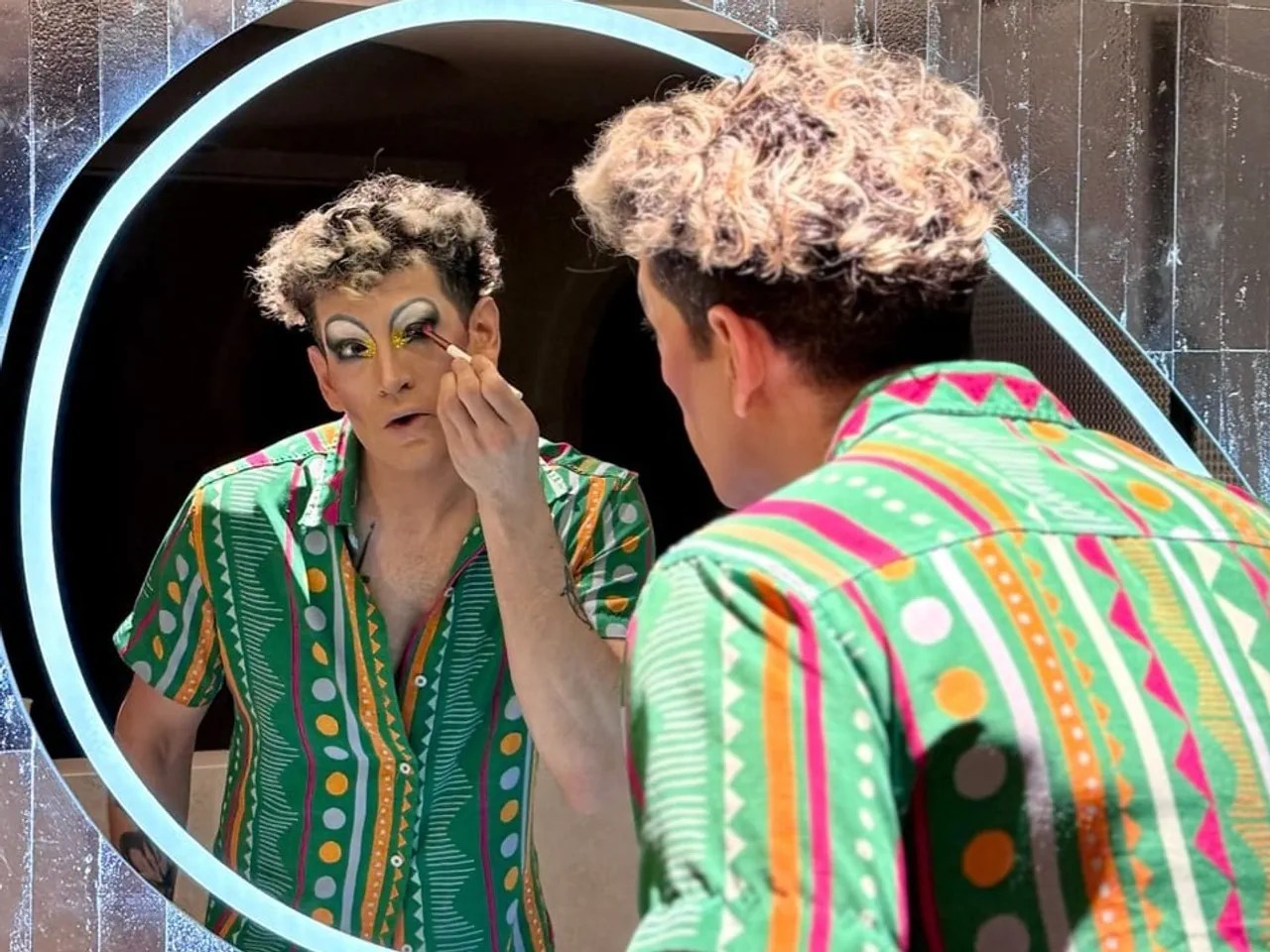Drag artist Daniel Hellmann is applying his make-up.