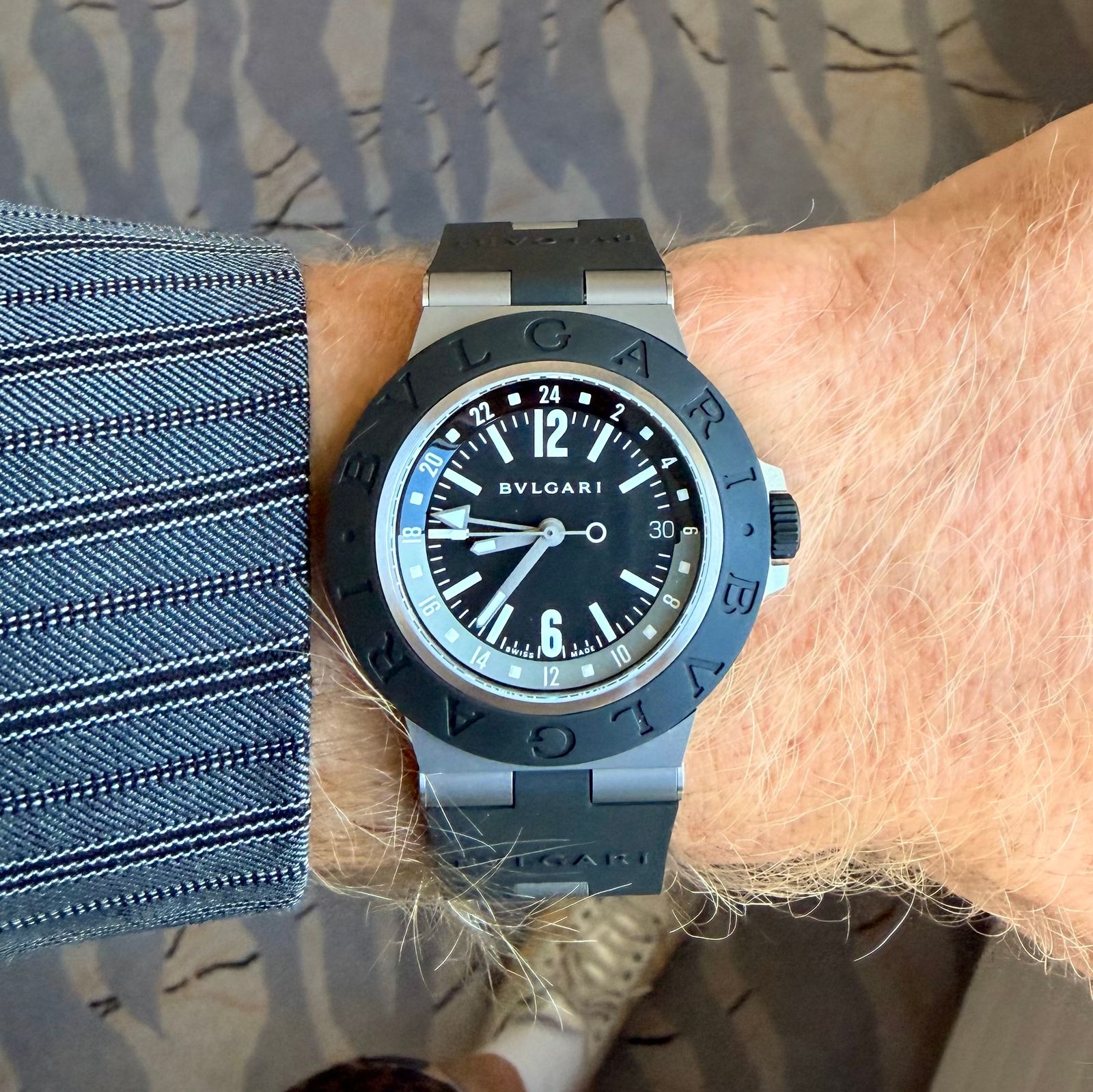 Image may contain Wristwatch Arm Body Part and Person