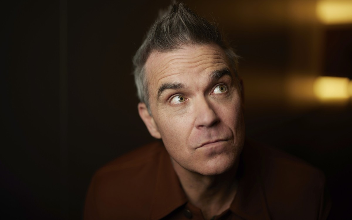 Robbie Williams poses for a portrait to promote the film "Better Man" on Wednesday, Nov. 13, 2024, in New York. (Photo by Matt Licari/Invision/AP)