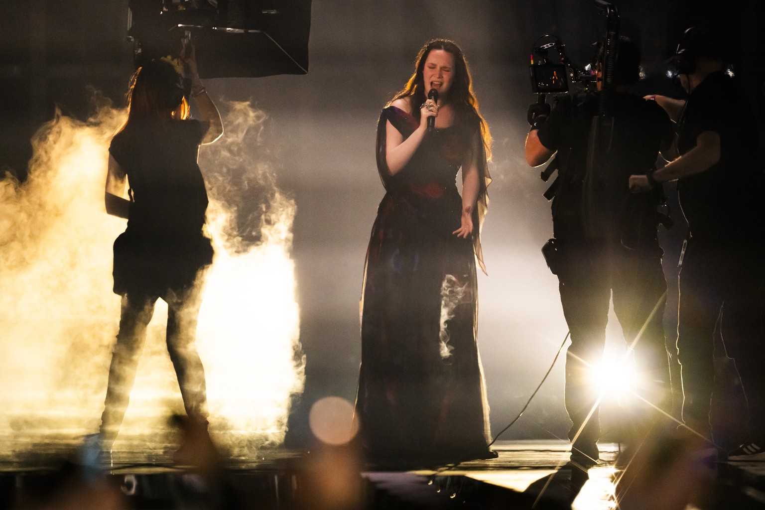 epa12097869 Switzerland's Zoe Me performs the song "Voyage" during the first semi-final of the 69th Eurovision Song Contest (ESC) in Basel, Switzerland, 13 May 2025. EPA/GEORGIOS KEFALA ...