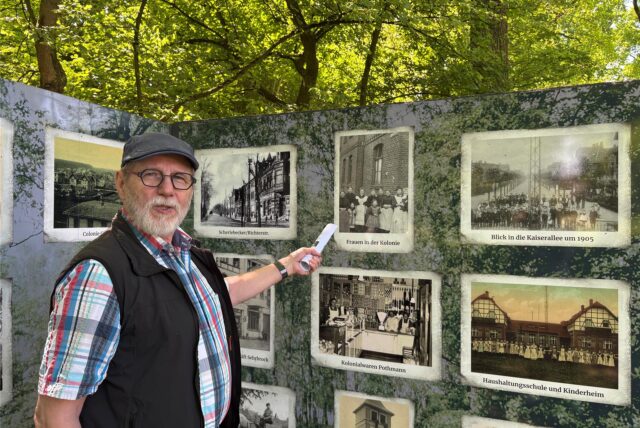 Peter Kitzol-Kohn steht vor der Geschichtswand im Gertrudenpark.