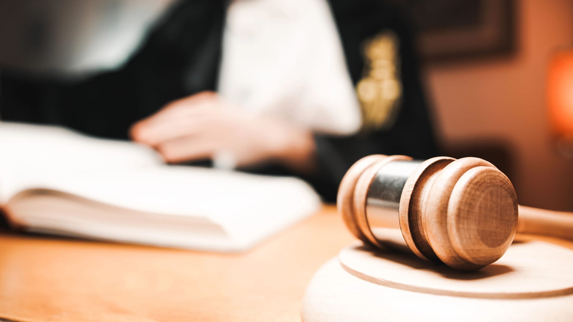 Judge In A Courtroom with hammer