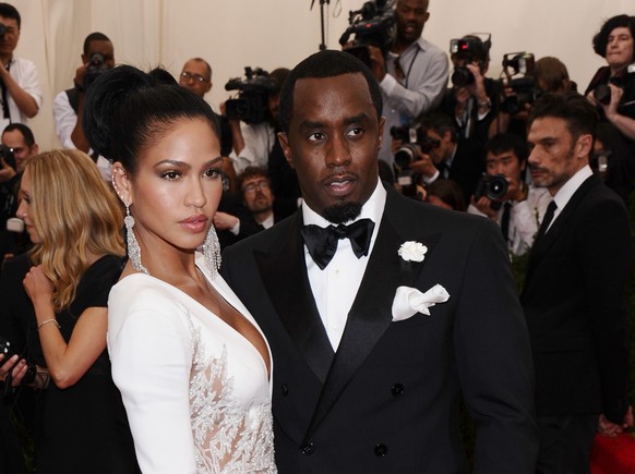 FILE - Cassie Ventura, left, and Sean "Diddy" Combs appear at The Metropolitan Museum of Art's Costume Institute benefit gala celebrating "China: Through the Looking Glass" in ...
