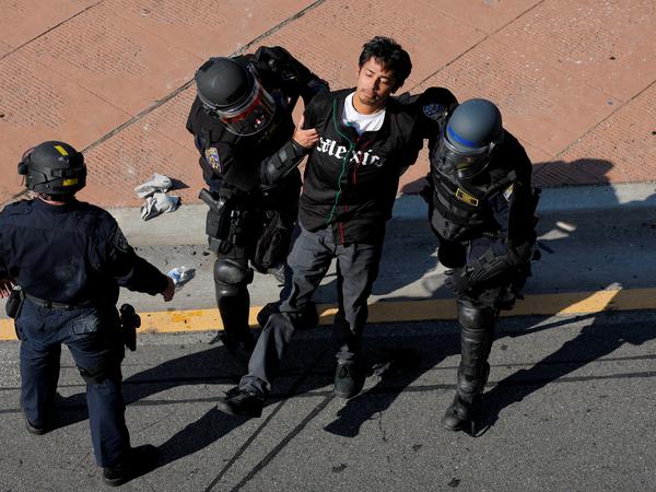 Police detain a demonstrator during a protest against federal immigration sweeps in downtown Los Angeles, California, U.S. June 8, 2025. REUTERS/Mike Blake     TPX IMAGES OF THE DAY     