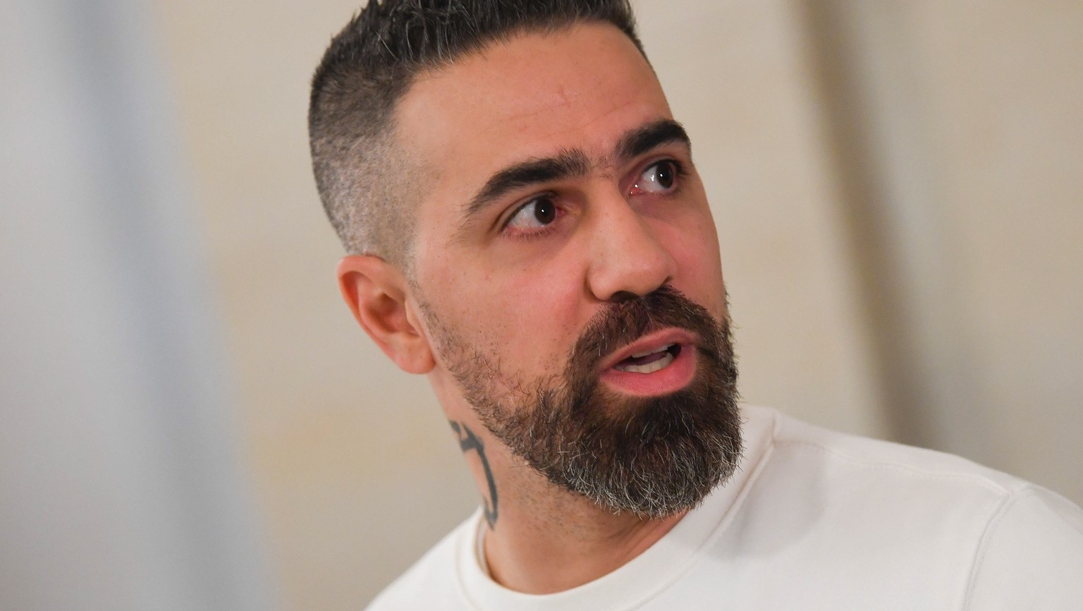epa07959842 German rapper Bushido at Federal Administrative Court in Leipzig, Germany, 30 October 2019. Federal Administrative Court decides on an AfD complaint against the Bushido his album "Son ...