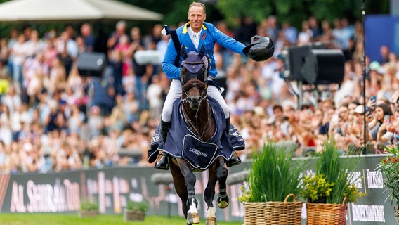 Der deutsche Reiter Christian Ahlmann mit Dourkhan Hero Z © Imago Images Foto: Stefan Lafrentz