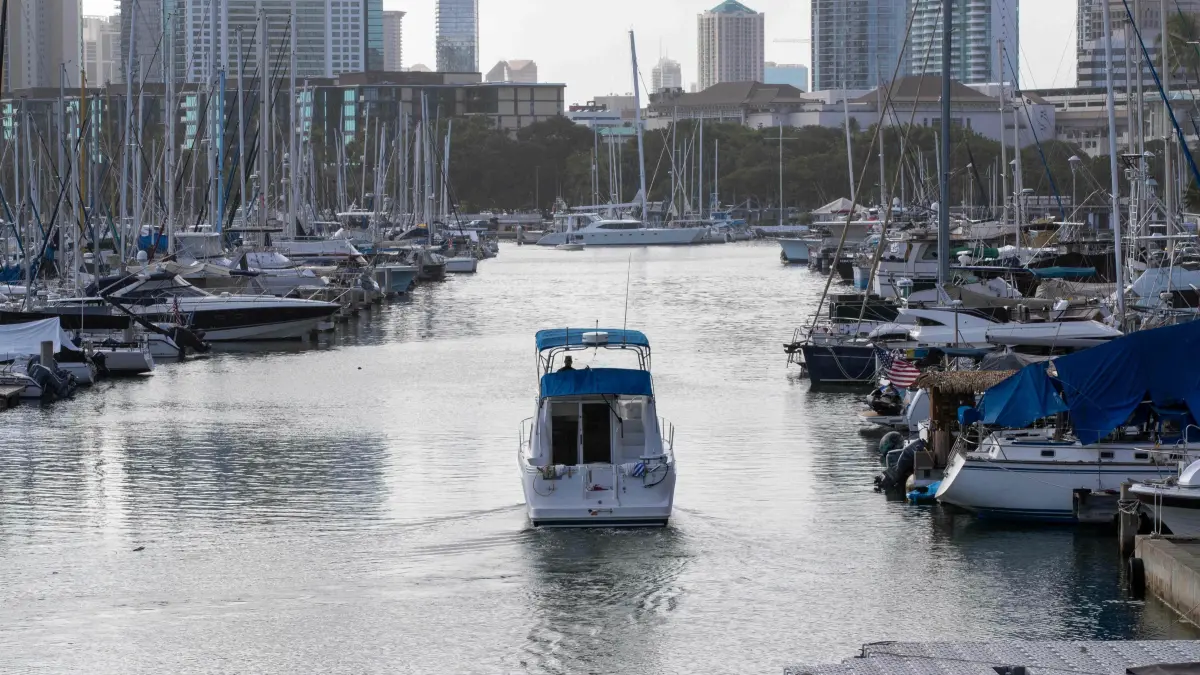 A boat leaves the Ala War Harbor, Waikiki, Oahu, Hawaii on July 29, 2025, after an 8.7 earthquake off of Russia's far east prompted tsunami alerts. A powerful 8.7 magnitude earthquake off Russia's far east has prompted tsunami alerts across parts of the Pacific including Japan, Hawaii, Russia and Ecuador, and warnings along the California coast, US authorities said late on July 29. The massive temblor triggered warnings of waves up to three metres (10 feet) possibly hitting the coasts of Russia, Hawaii and even Ecuador and Chile along South America's west coast, according to the US Pacific Tsunami Warning Center based in Honolulu, Hawaii. (Photo by Eugene Tanner / AFP)