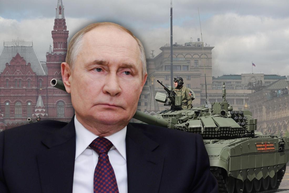 Wladimir Putin vor einem russischen Panzer.