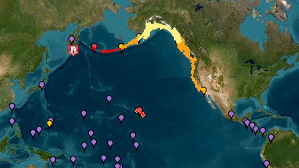 Dieses Bild der Nationalen Ozean- und Atmosphärenbehörde der USA zeigt aktuelle Tsunami-Warnungen (rot), Tsunami-Hinweise (orange), Tsunami-Vorwarnungen (gelb) und weitere möglicherweise gefährdete Gebiete (violett).