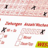 Ein ausgefüllter Lottoschein mit Kreuzchen.