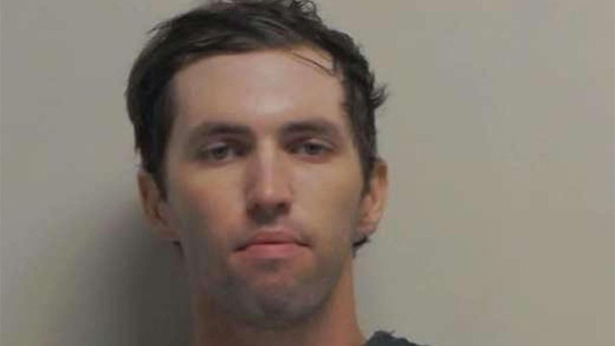 This handout released by the Utah Governor's Office on September 13, 2025 shows the booking photo of Tyler Robinson, the suspect in the shooting death of right-wing activist Charlie Kirk. Authorities announced on September 12 that they had taken into custody Tyler Robinson, the person believed to have assassinated Charlie Kirk, a right-wing activist and close ally of President Donald Trump. He was shot while speaking at an event on September 10 at Utah Valley University (UVU), in the city of Orem, Utah. (Photo by Utah Governor's Office / AFP) / RESTRICTED TO EDITORIAL USE - MANDATORY CREDIT 