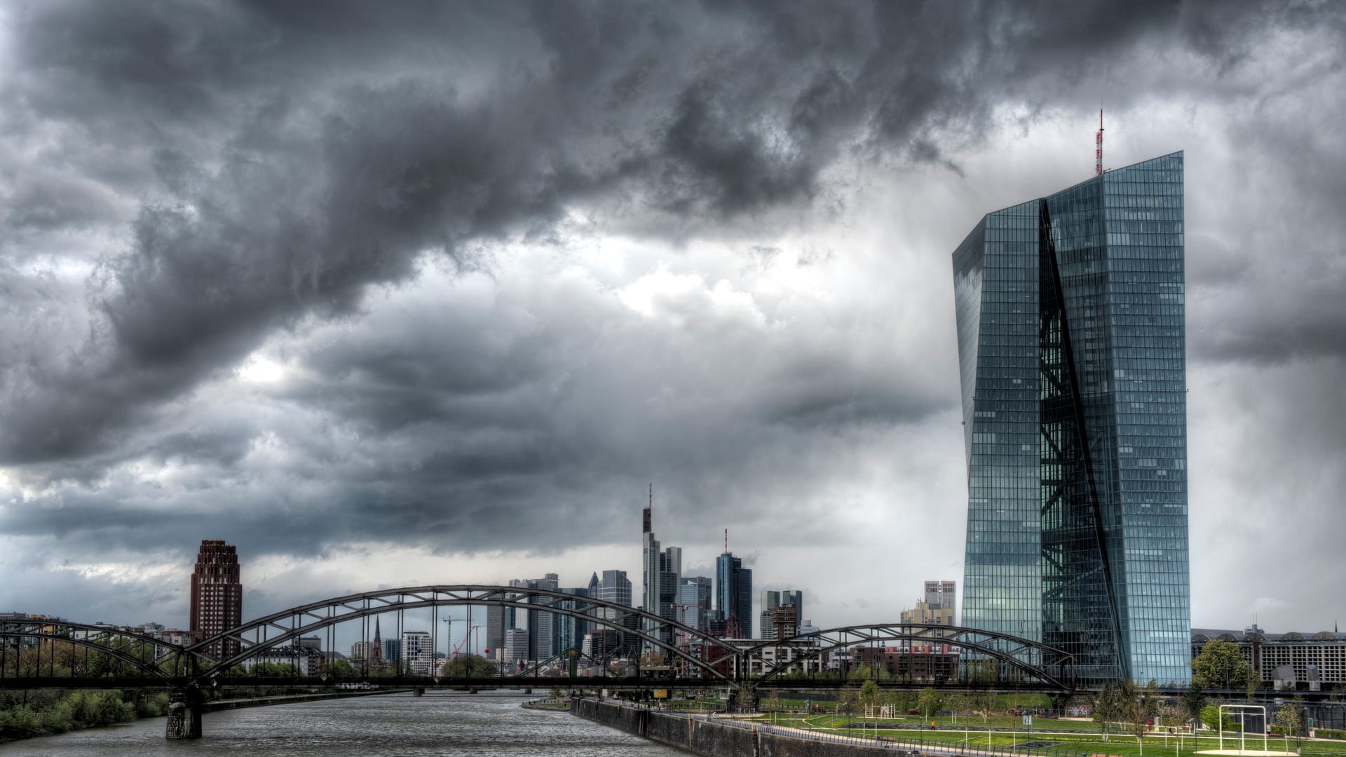 The ECB (European Central Bank) in Frankfurt am Main in front of a dramatic sky