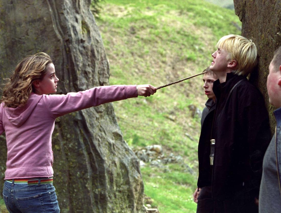 Emma Watson als Hermine und Tom Felton als Draco in Harry Potter.