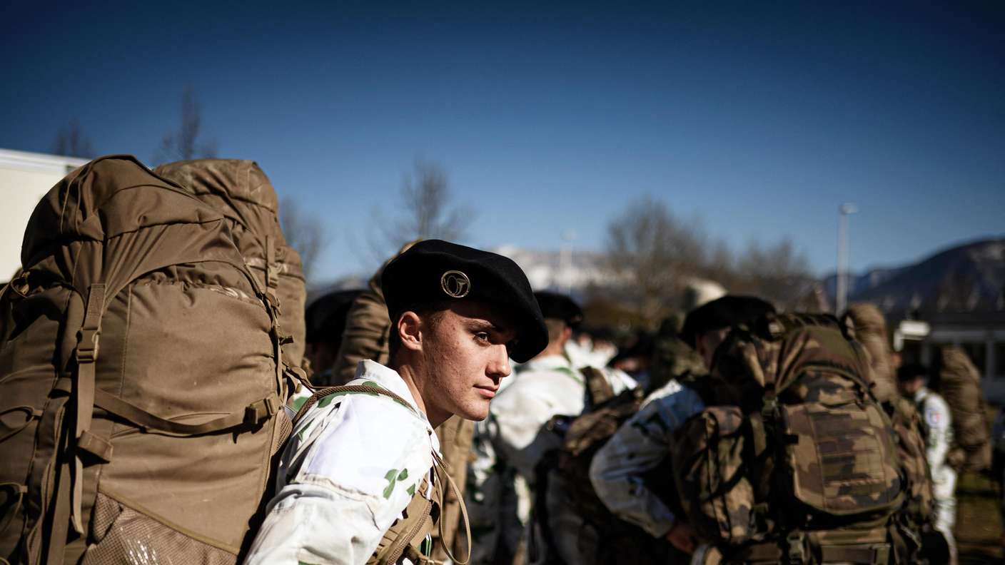 French soldiers of the 27e Bataillons de Chasseurs Alpins prepare to leave for Romania at the Cran Gevrier military base, near Annecy, on February 28, 2022. Russian President launched a full-scale invasion of Ukraine on February 24. (Photo by JEFF PACHOUD / AFP)