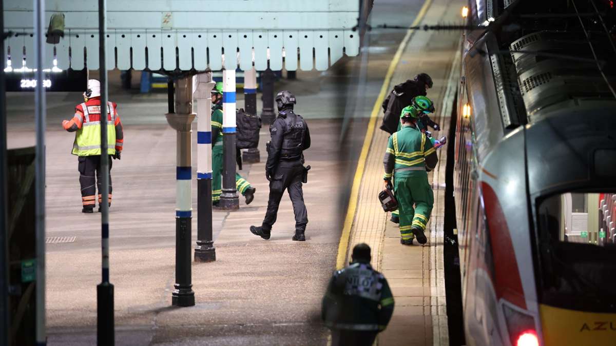 Rettungskräfte arbeiten auf dem Bahnsteig des Bahnhofs Huntingdon in England, nachdem mehrere Personen niedergestochen worden waren.