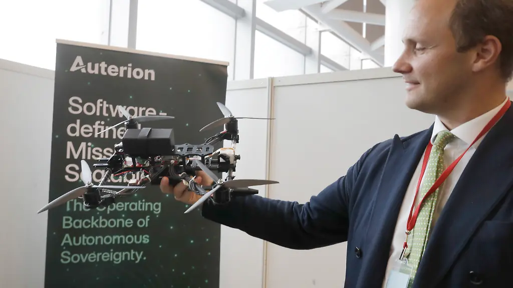 A-staff-of-Auterion-displays-a-drone-as-Taiwan-s-Ministry-of-National-Defense-holds-a-demonstration-of-its-latest-naval-technology-in-Su-Ao-I-Lan-County-Taiwan-Tuesday-June-17-2025