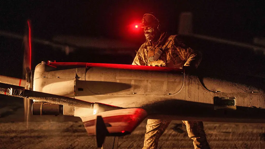 FILE-A-Ukrainian-serviceman-of-the-14th-Separate-Unmanned-Aerial-Systems-Regiment-prepares-a-long-range-drone-An-196-Liutyi-before-takeoff-in-undisclosed-location-Ukraine-Tuesday-Oct-14-2025