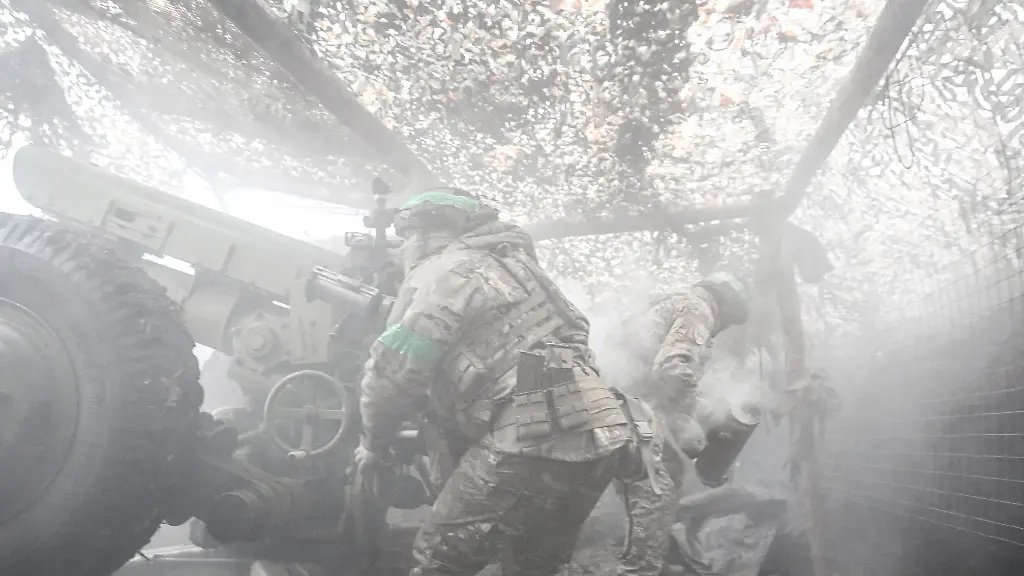 Soldiers-from-an-artillery-crew-of-the-Striletskyi-special-forces-police-battalion-of-the-Main-Department-of-the-National-Police-in-Zaporizhzhia-region-fire-a-122-mm-howitzer-D-30-at-the-positions-of-Russian-troops-in-the-Pokrovsk-direction-in-Donetsk-region-Ukraine-November-20-2025-Photo-by-Dmytro-Smolienko-Ukrinform-ABACAPRESS