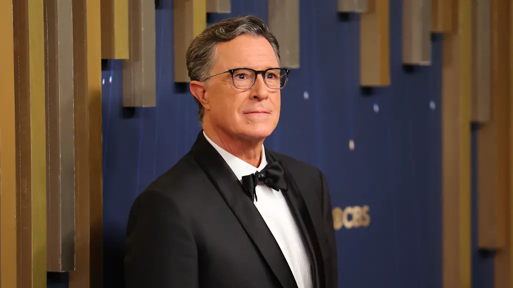 Stephen-Colbert-poses-on-the-red-carpet-at-the-77th-Primetime-Emmy-Awards-in-Los-Angeles-California-U-S-September-14-2025