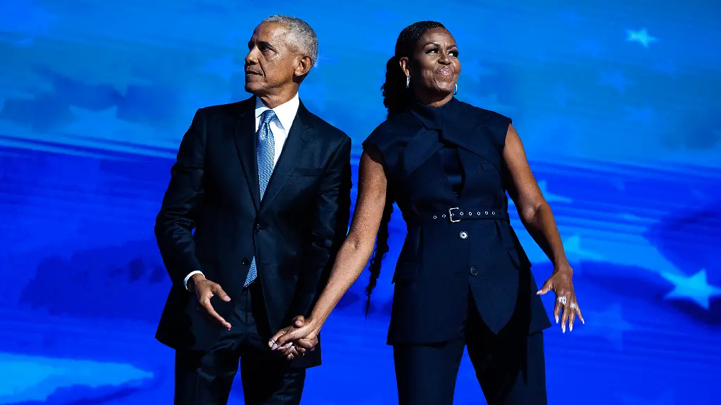 UNITED-STATES-AUGUST-20-Former-President-Barack-Obama-and-former-first-lady-Michelle-Obama-appear-on-stage-on-the-second-night-of-the-Democratic-National-Convention-at-the-United-Center-in-Chicago-Ill-on-Tuesday-August-20-2024
