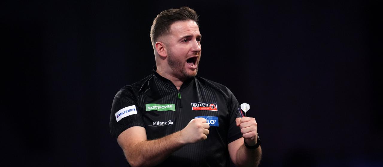 Deutschlands Arno Merk bejubelt seinen Sieg über Peter Wright