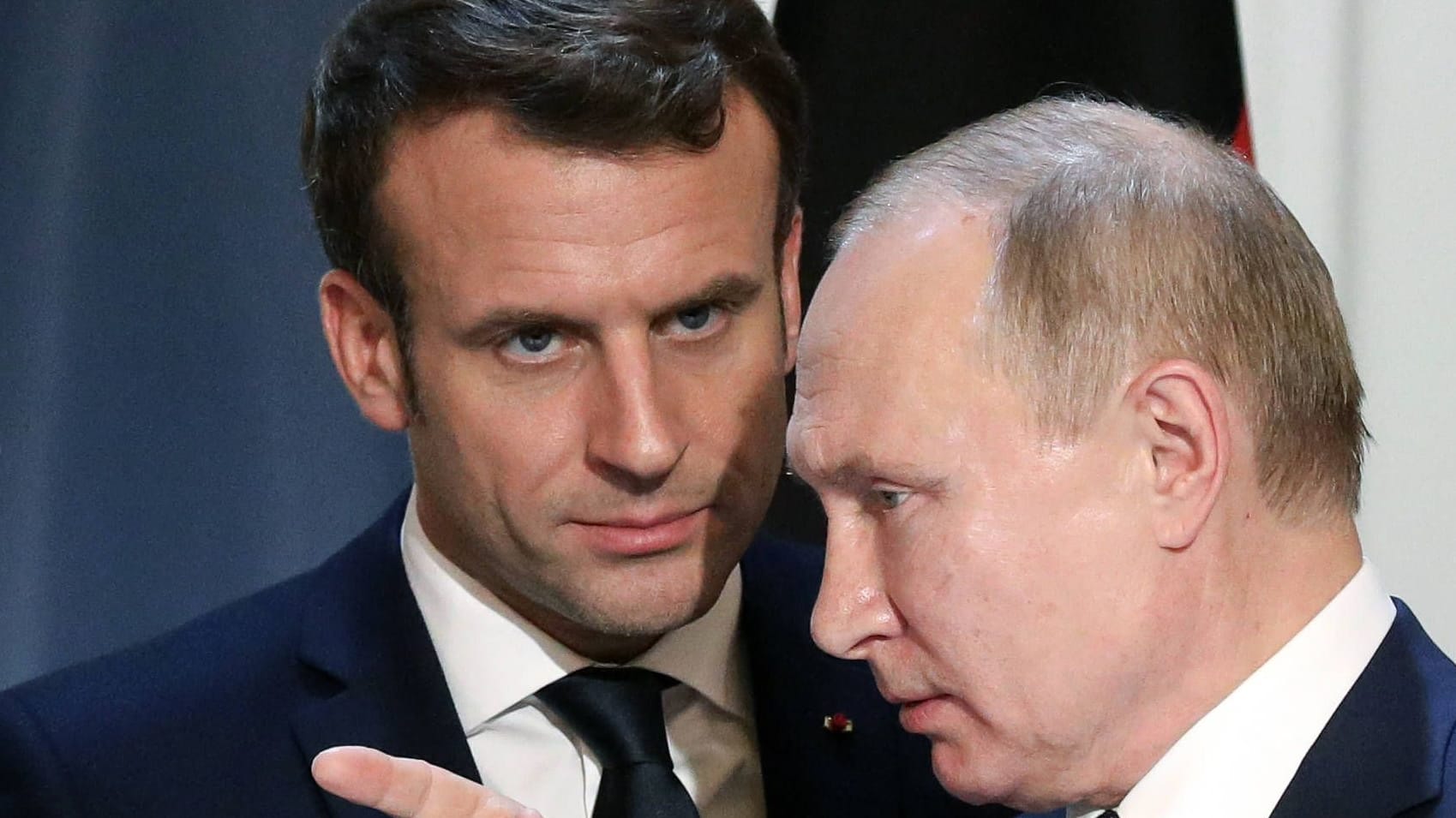Putin (r.), Merkel und Frankreichs Präsident Emmanuel Macron im Jahr 2019 in Paris.