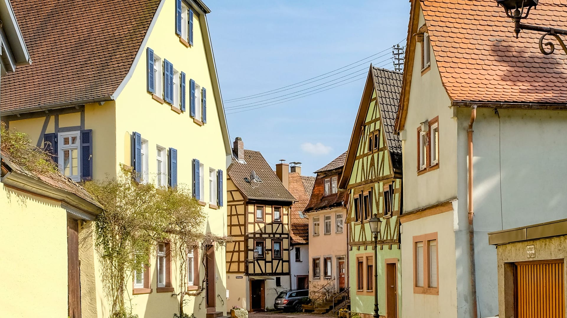 scenic old road with cobble stone and half timbered houses in Marktheidenfeld, Germany