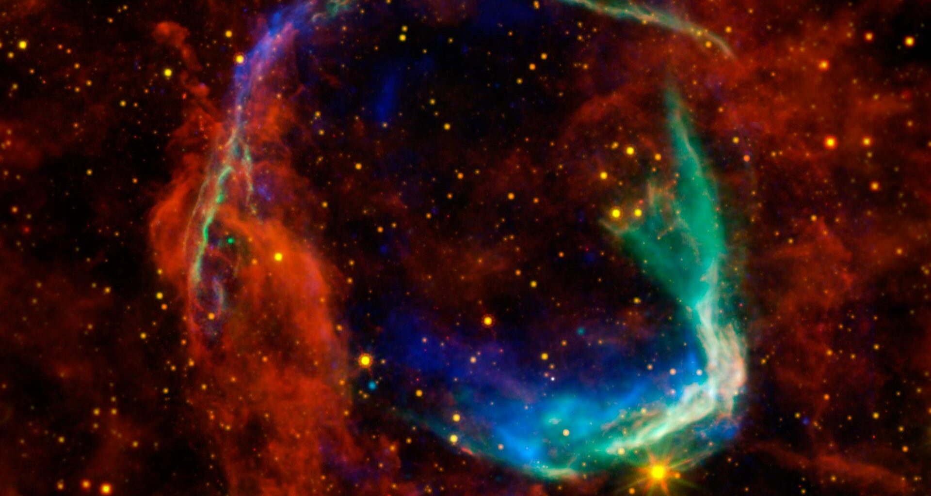 Eine bunte Illustration zeigt den Überrest eines explodierten Sterns in gut 9000 Lichtjahren Entfernung,  in Falschfarben dargestellt.