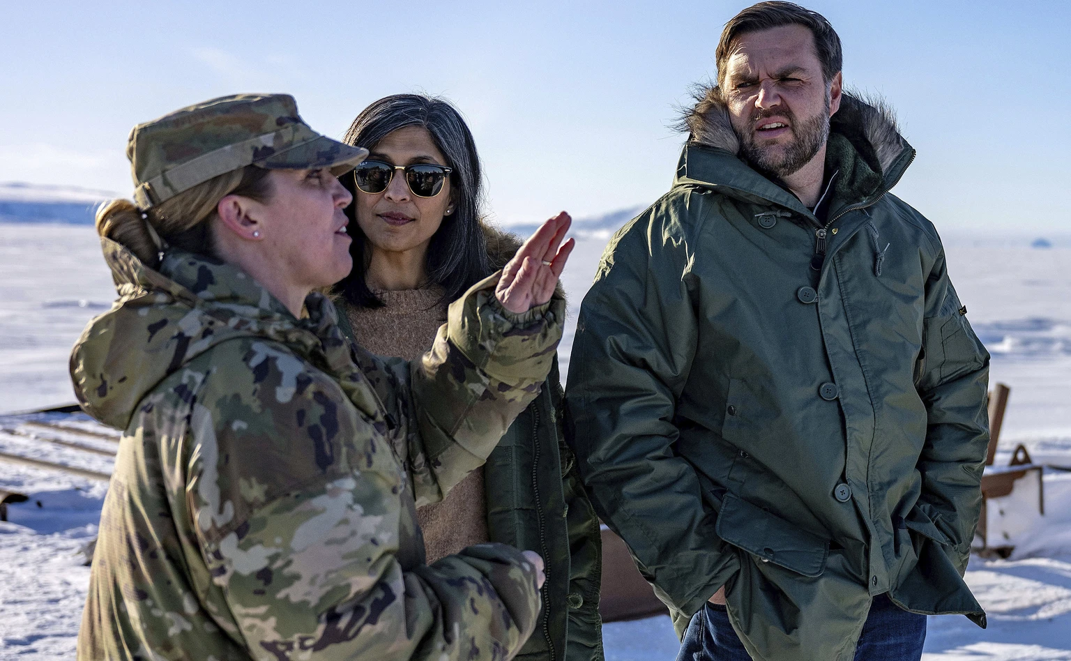 Vice President JD Vance and second lady Usha Vance listen to Col. Susan Meyers as they tour the U.S. military's Pituffik Space Base in Greenland, Friday, March 28, 2025. (Jim Watson/Pool via AP,  ...