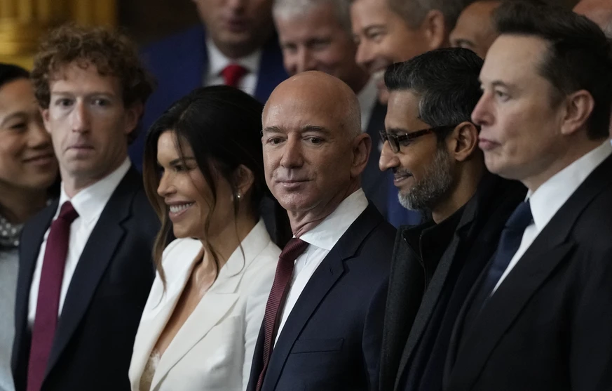 Guests including Mark Zuckerberg, Jeff Bezos, Sundar Pichai and Elon Musk, arrive before the 60th Presidential Inauguration in the Rotunda of the U.S. Capitol in Washington, Monday, Jan. 20, 2025. (AP ...