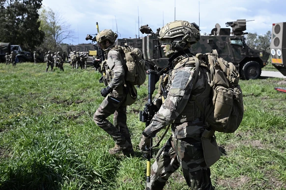 epa11989863 French soldiers of the 21st RIMA (Marine Infantry Regiment) take part in the Argos Spring 25 exercise in Frejus, south of France, 26 March 2025. The exercise takes place from 24 to 28 Marc ...