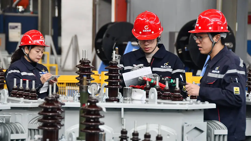 China-Manufacturing-Industry-HANDAN-CHINA-FEBRUARY-21-2025-A-worker-assembles-transformers-at-a-production-workshop-of-Hebei-Gaojing-Electrical-Equipment-Co-LTD-in-Yongnian-District-industrial-Park-in-Handan-North-China-s-Hebei-province-Feb-21-2025