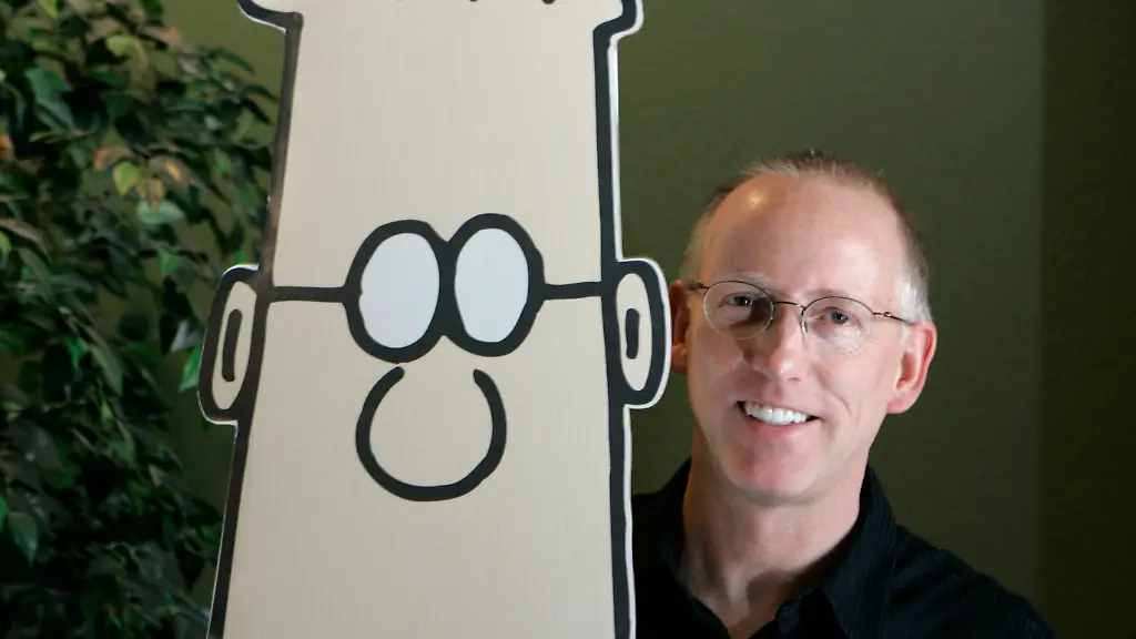 FLE-Scott-Adams-creator-of-the-comic-strip-Dilbert-poses-for-a-portrait-with-the-Dilbert-character-in-his-studio-in-Dublin-Calif-Oct-26-2006