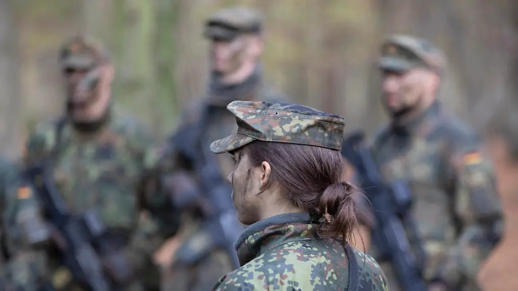 GERMANY-AHLEN-NOVEMBER-13-German-army-Bundeswehr-recruits-both-male-and-female-during-combat-exercises-on-November-13-2025-in-Ahlen-Germany-The-six-month-basic-training-course-for-German-Armed-Forces-recruits-has-replaced-the-three-month-basic-training-course-since-July-2025-The-aim-of-the-basic-trainingis-to-prepare-recruits-for-the-demands-of-national-and-and-alliance-defense