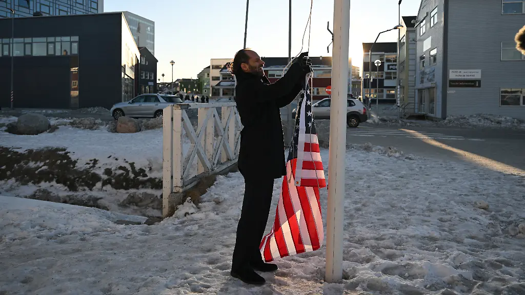 German-Comedian-Maxi-Schafroth-tries-to-rise-an-American-flag-in-the-city-of-Nuuk-western-Greenland-on-January-28-2026