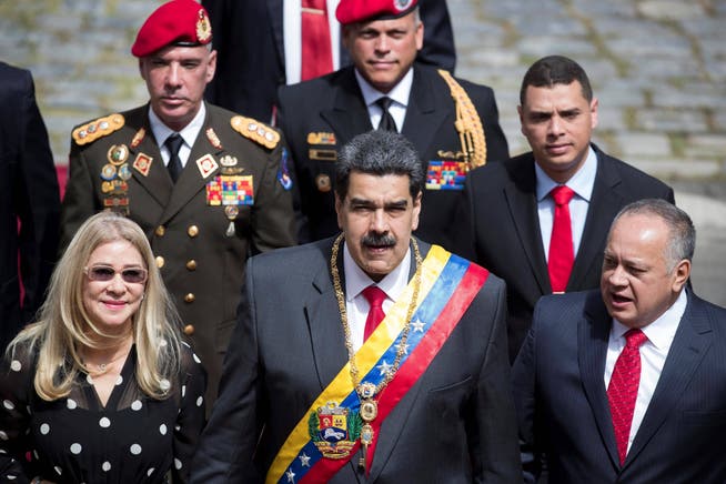  The president of Venezuela, Nicolas Maduro C, together with the head of the National Constituent Assembly ANC Diosdado Cabello R and the first lady Cilia Flores L, arrives at the Federal Legislative Palace to give his Annual Message of Memory and Account, in Caracas, Venezuela, 14 January 2020. Maduro asked the National Electoral Council CNE to invite the European Union EU and the United Nations UN to observe the legislative elections planned for this year, although not yet dated, but not to the Organization of American States OAS. That the European Union, the UN Secretary General, the African Union and all organizations be invited extensively to come and see how the people of Venezuela, a free people, elect their new Assembly National AN, Parliament, Maduro said during the presentation of his 2019 balance. Maduro inv PUBLICATIONxINxGERxSUIxAUTxONLY Copyright: xRaynerxPenax JJPANA9579 20200114-637146252684964140