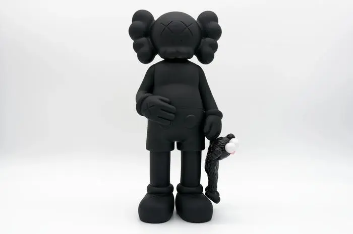 March 14 2023: KAWS Share Black Vinyl Designer Art Toy Released February 25th, 2020 on kawsone.com artist name Brian Donnelly