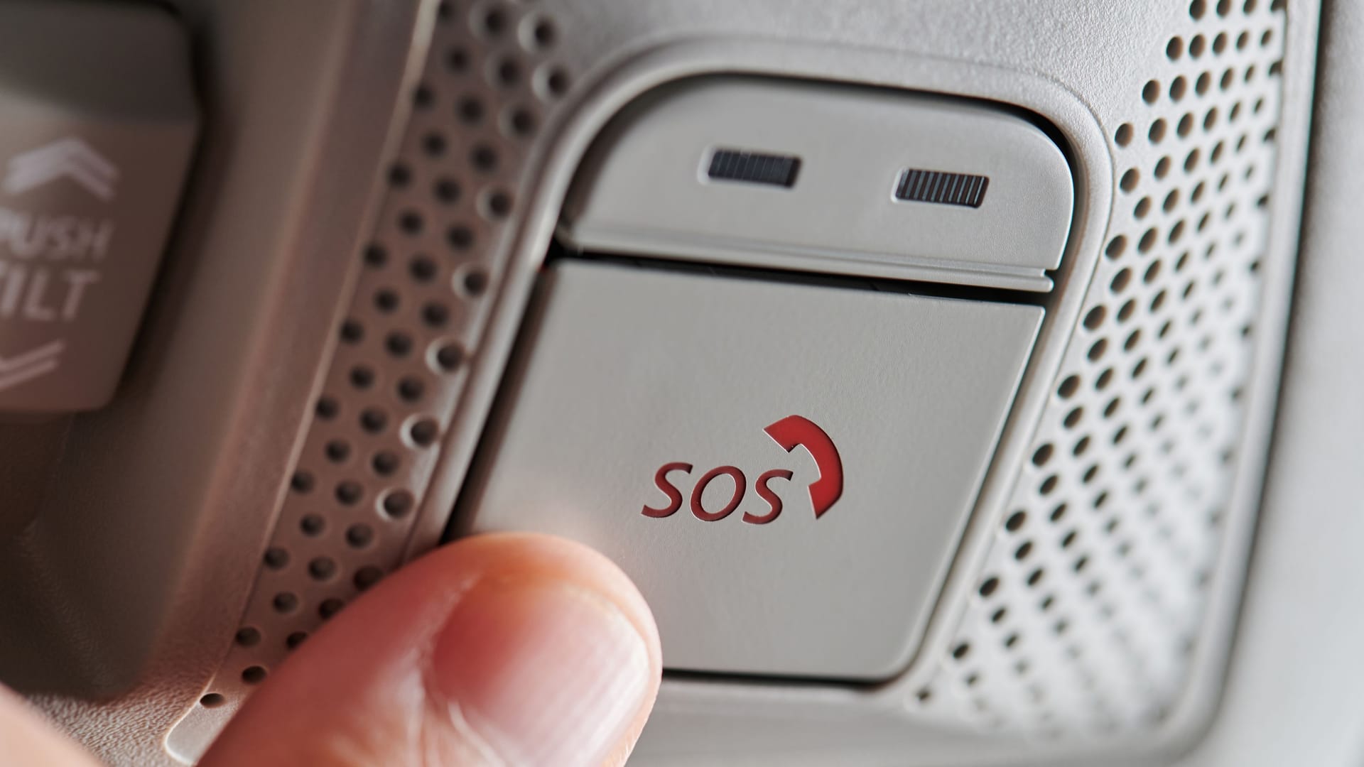 Pushing sos button in car