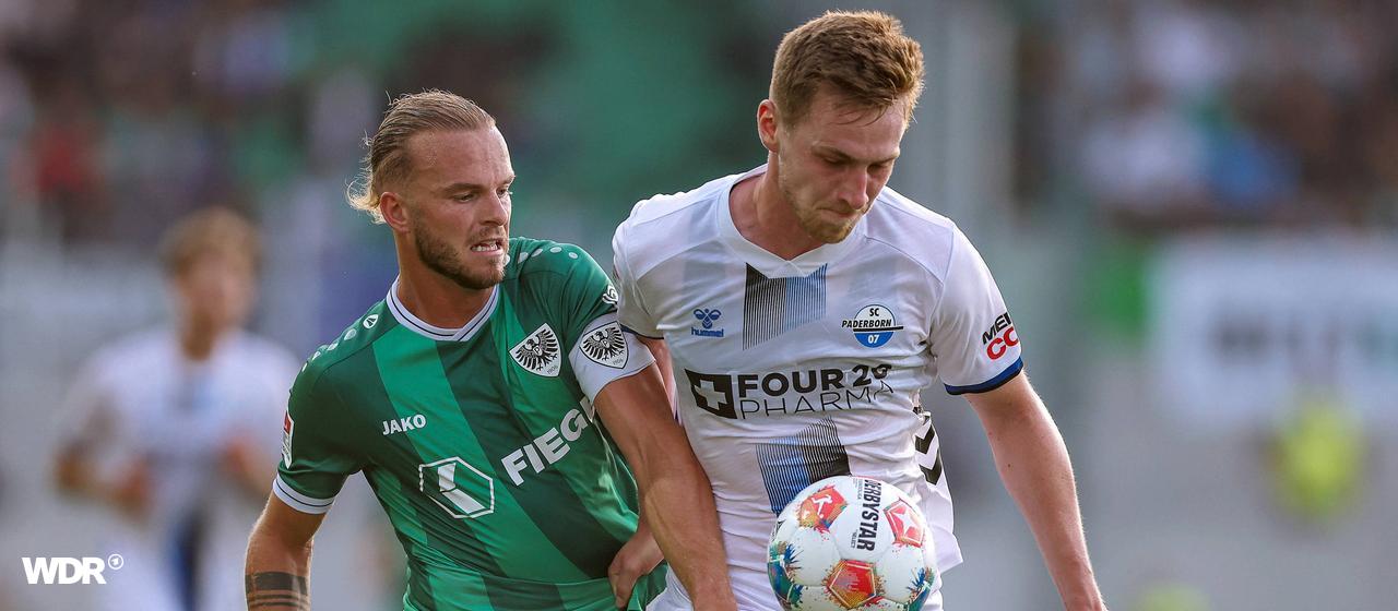 Jorrit Hendrix (links) von Preußen Münster im Zweikampf gegen Paderborns Tjark Scheller im Hinspiel der Saison 2025/26.